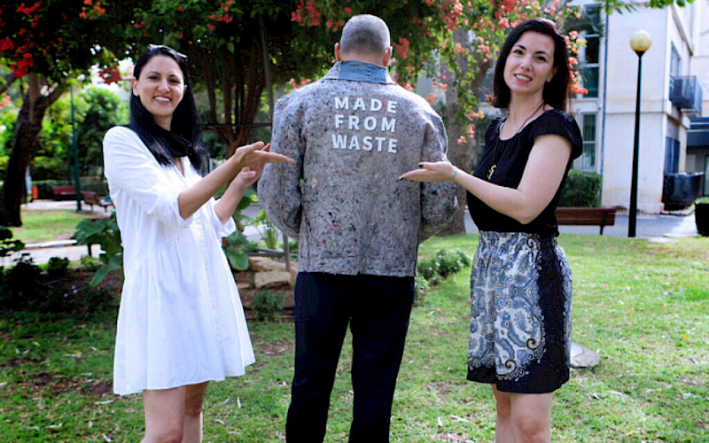 Re-Fresh Global founders presenting a jacket made from waste. Photo: Re-Fresh Global